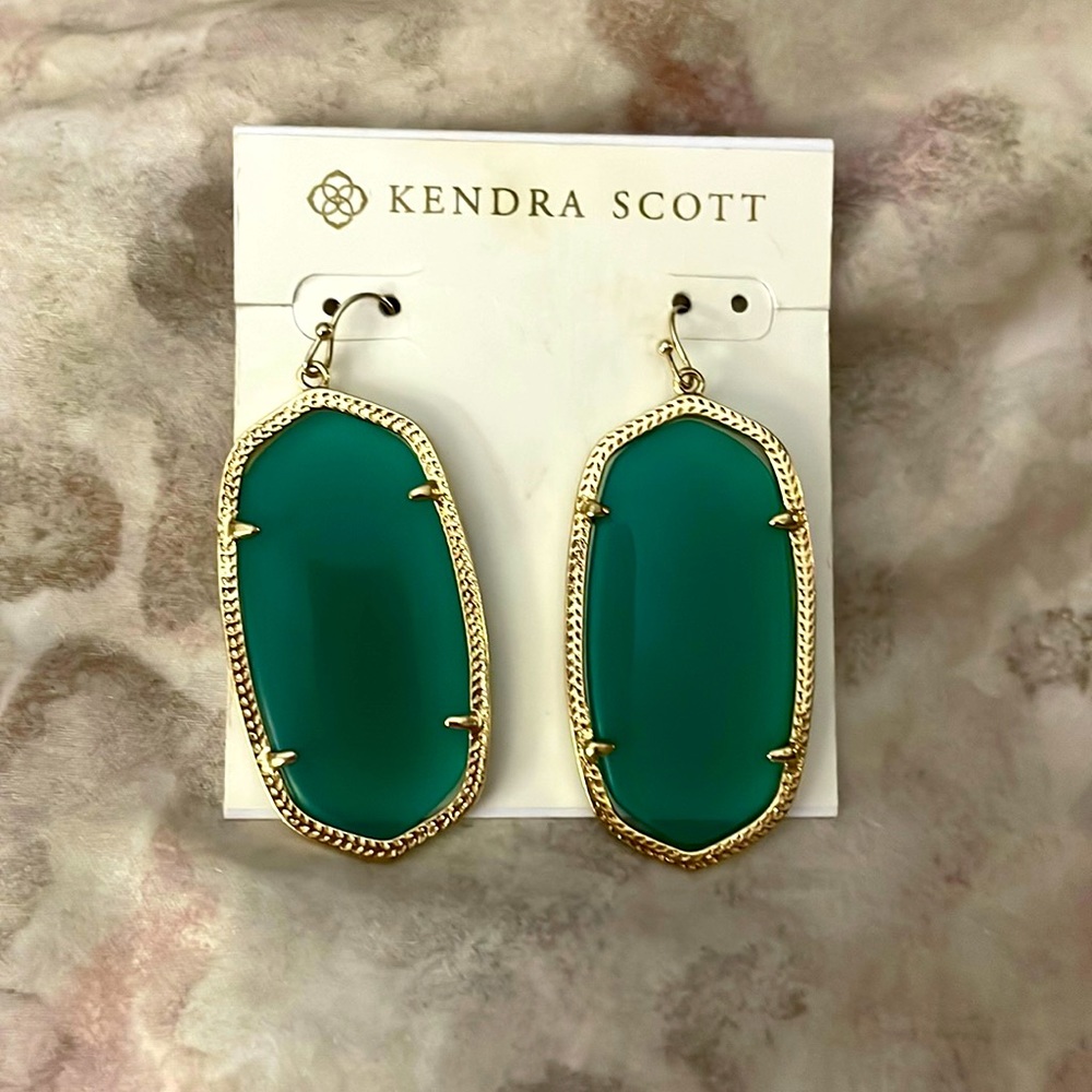 Kendra Scott earrings.